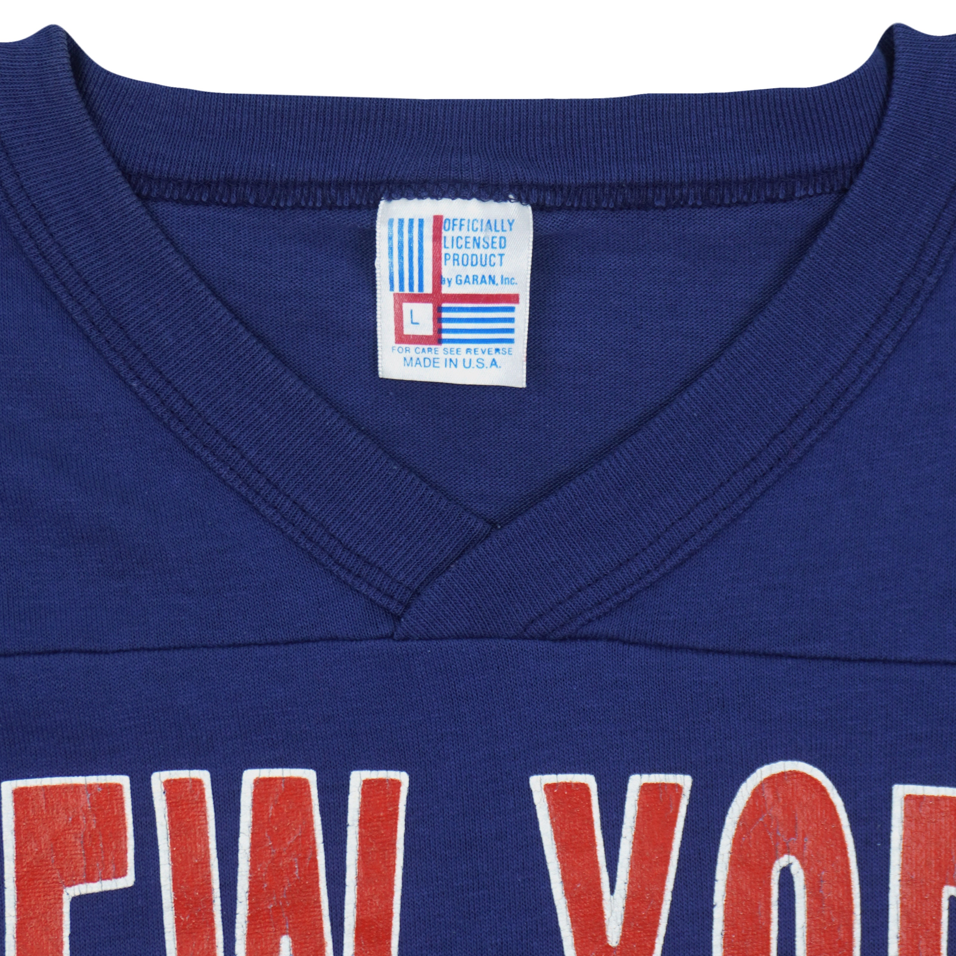 Garan Large label inside the blue V-neck jersey collar