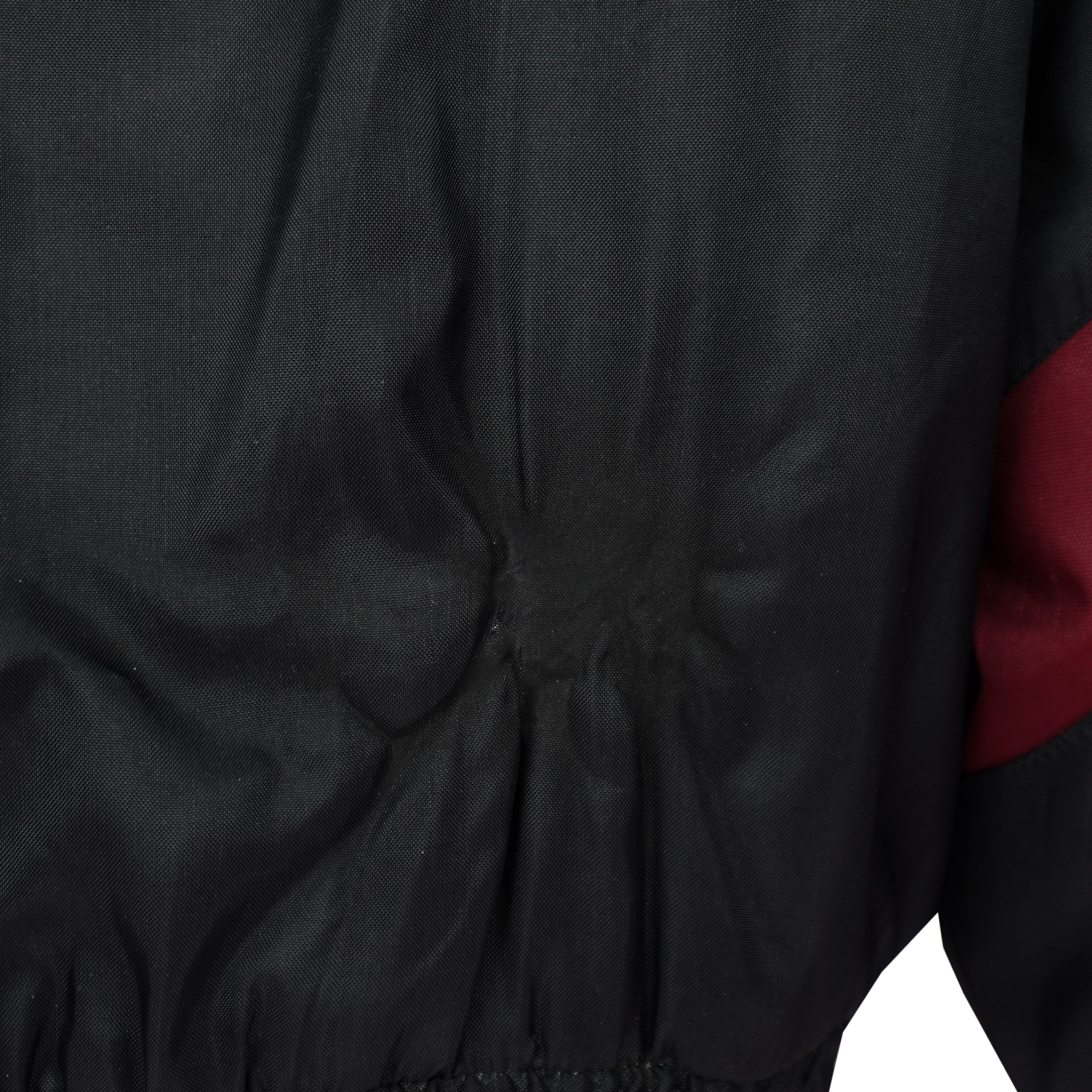 Texas A&M Aggies puffer jacket condition detail showing surface wear