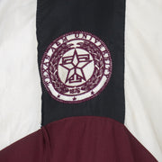Texas A&M 1876 embroidered seal detail