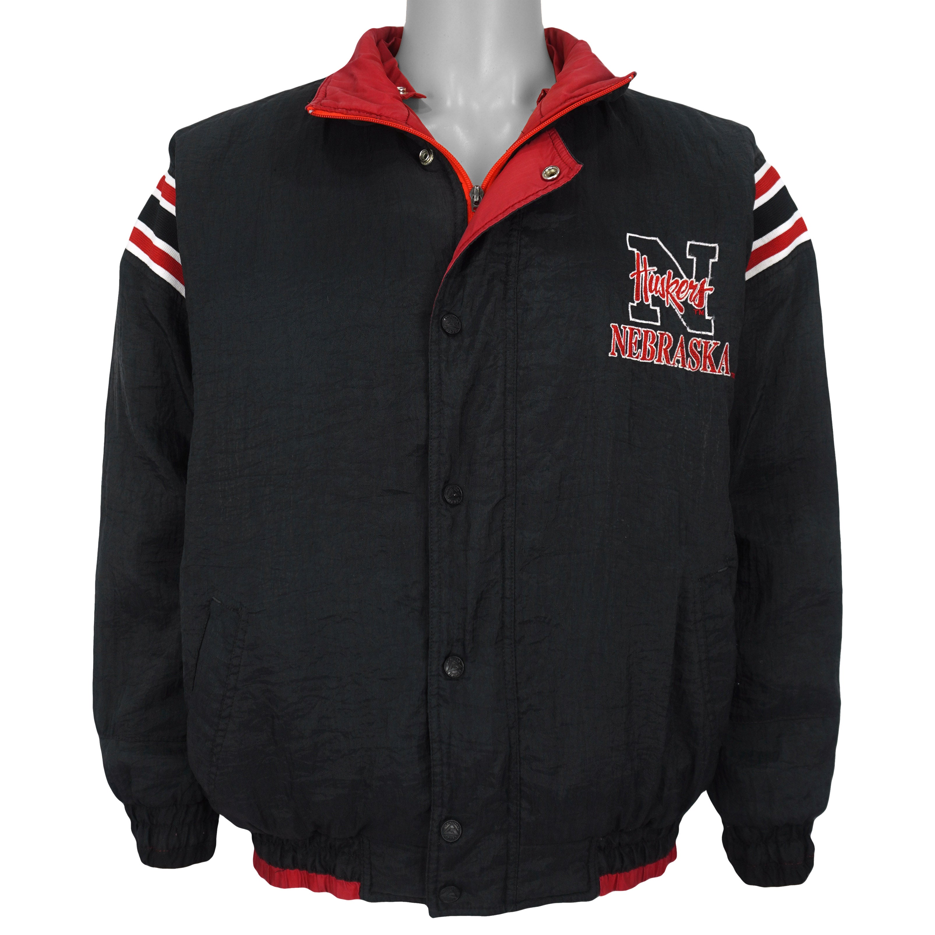 Genuine Stuff Nebraska Huskers reversible puffer jacket black-side front view