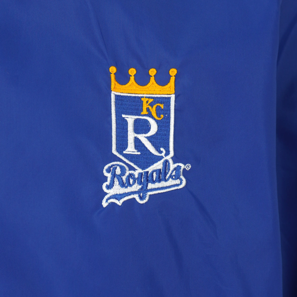 Embroidered Kansas City Royals crest on the blue chest