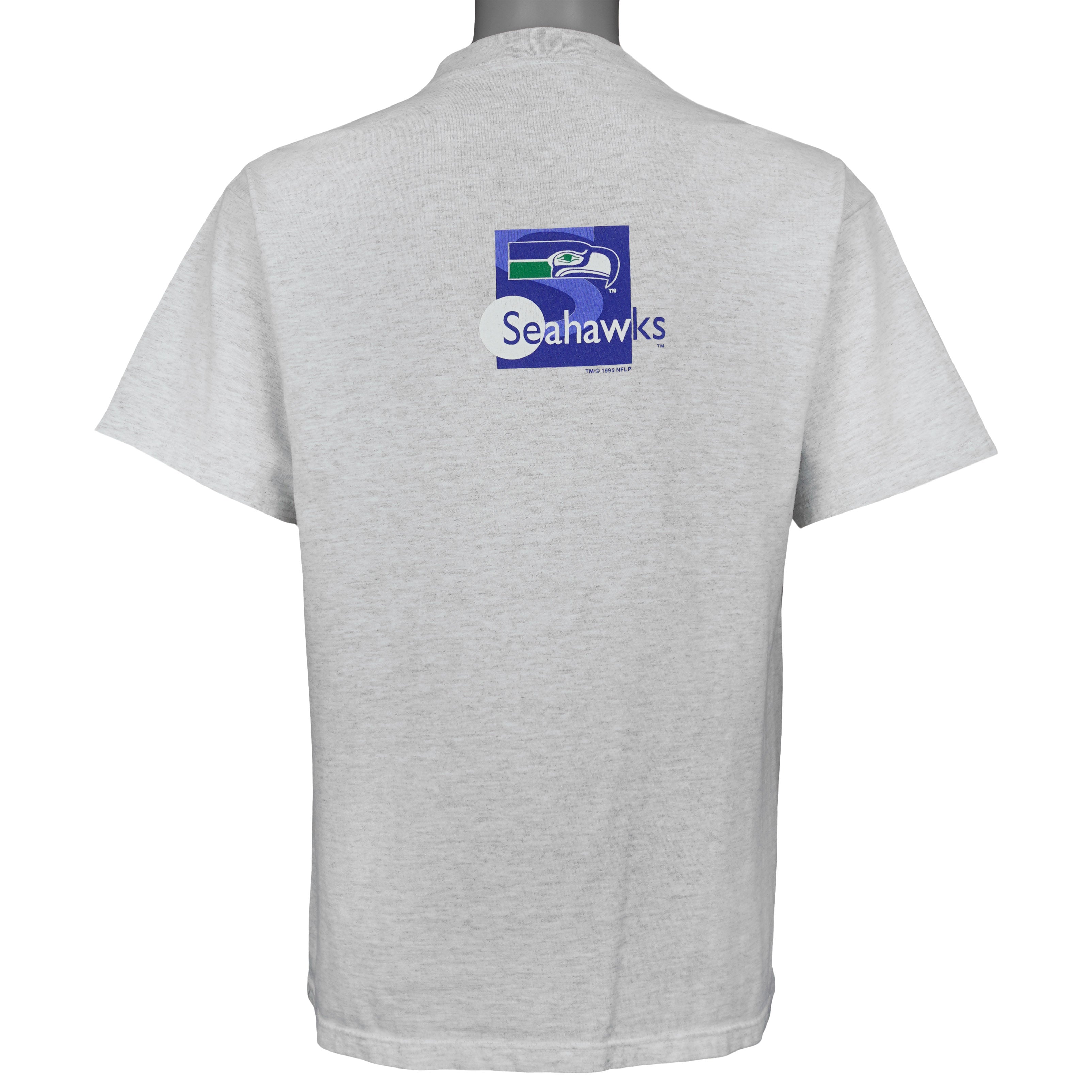 Back of the gray Seahawks shirt with a small upper logo