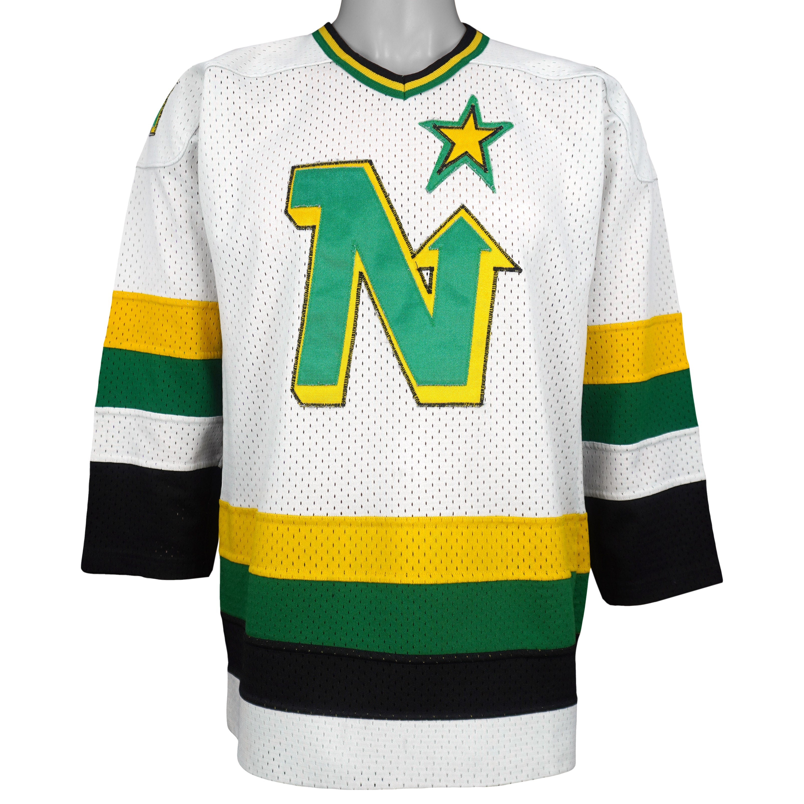 Vintage NHL - Minnesota North Stars Hockey Jersey T-Shirt 1990s Large in black and white and green