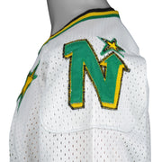 Vintage NHL - Minnesota North Stars Hockey Jersey T-Shirt 1990s Large in black and white and green