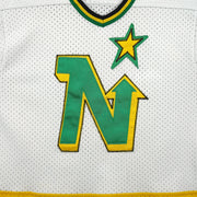 Vintage NHL - Minnesota North Stars Hockey Jersey T-Shirt 1990s Large in black and white and green