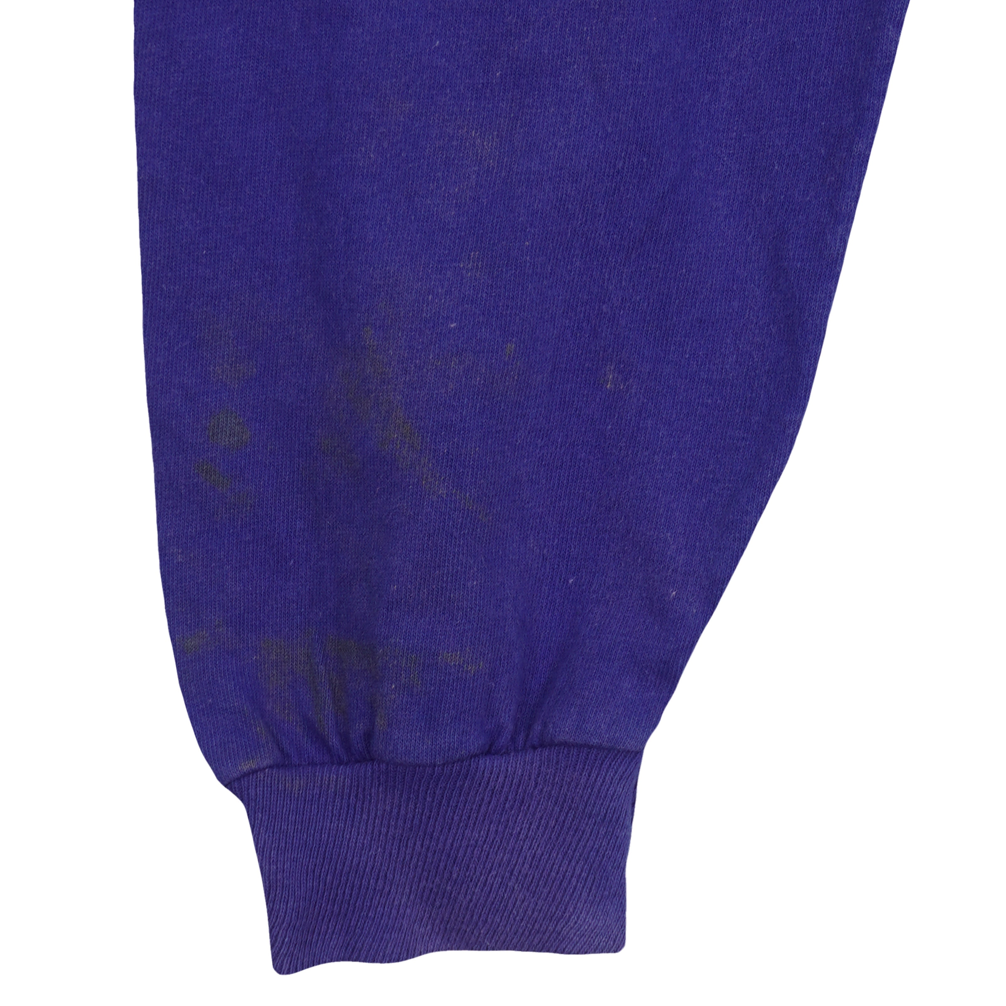 Discoloration and marks on the blue sleeve above the cuff