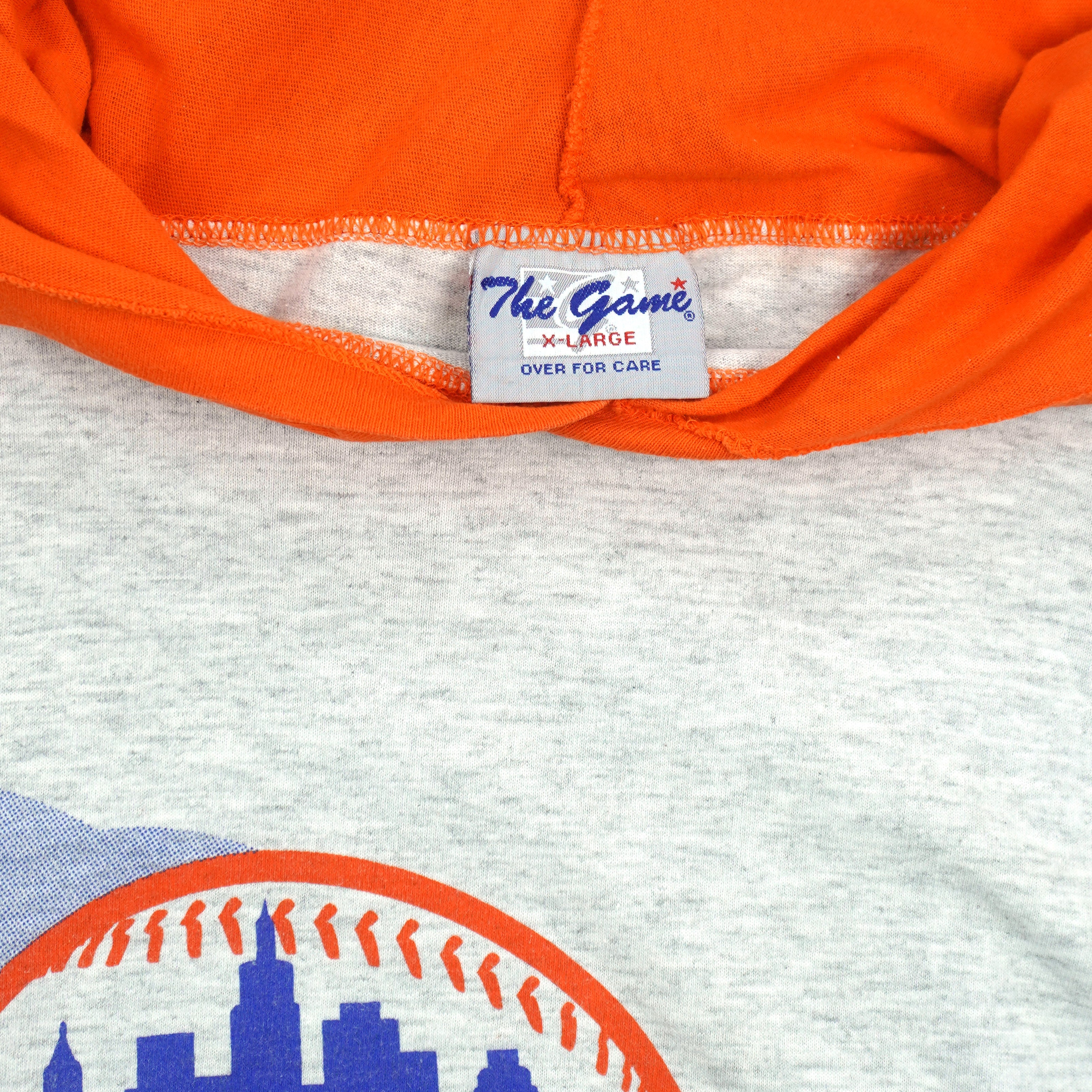 The Game X-Large label beneath the orange hood
