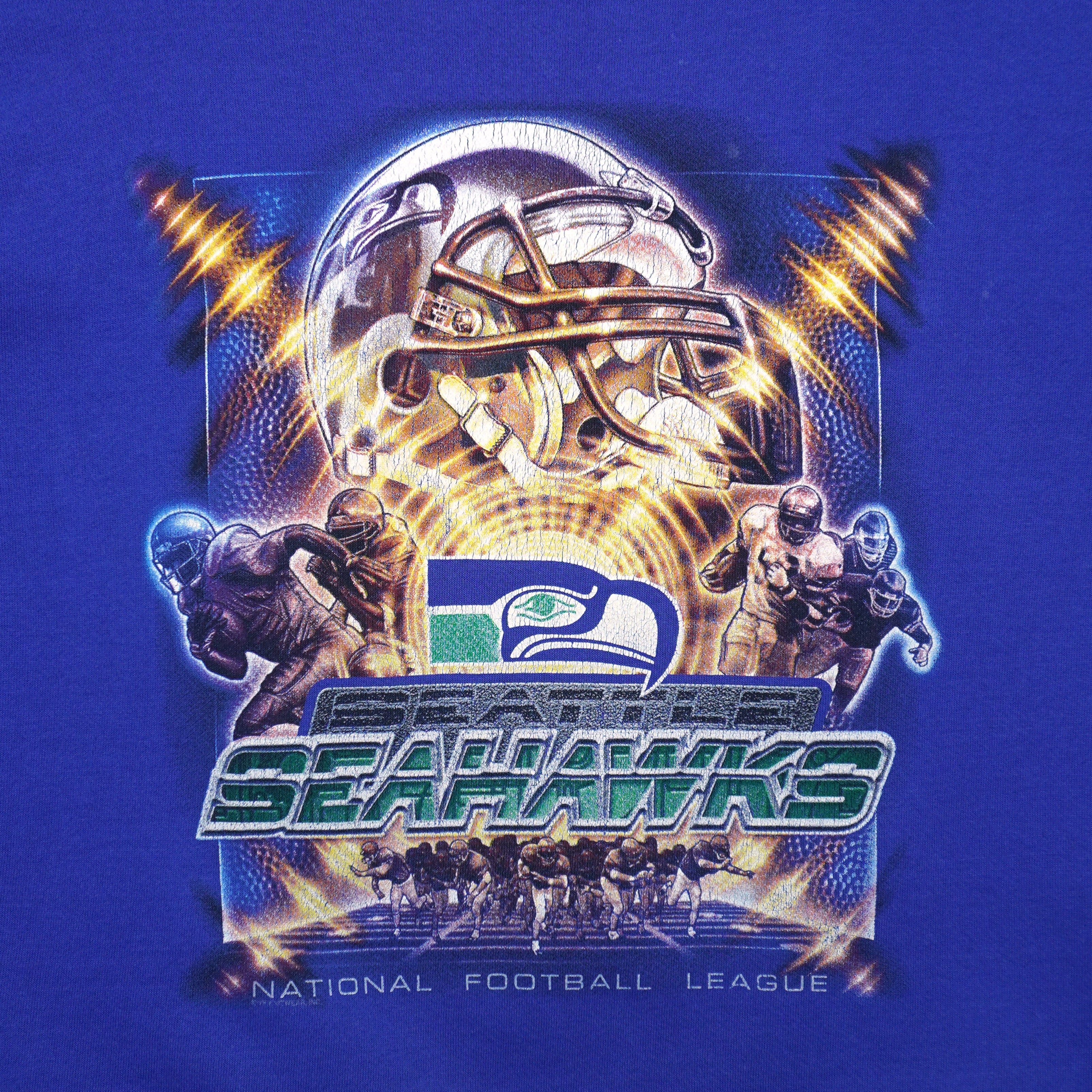 Front graphic with Seahawks lettering and football imagery