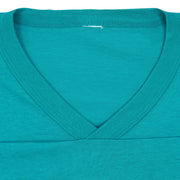 V-neck collar and removed label area of the Dolphins jersey