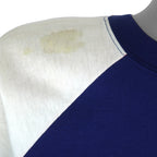 Pale discoloration on the white shoulder of the Red Sox shirt