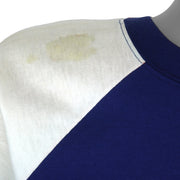 Pale discoloration on the white shoulder of the Red Sox shirt
