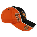 Angled view of the orange panels and split-color brim