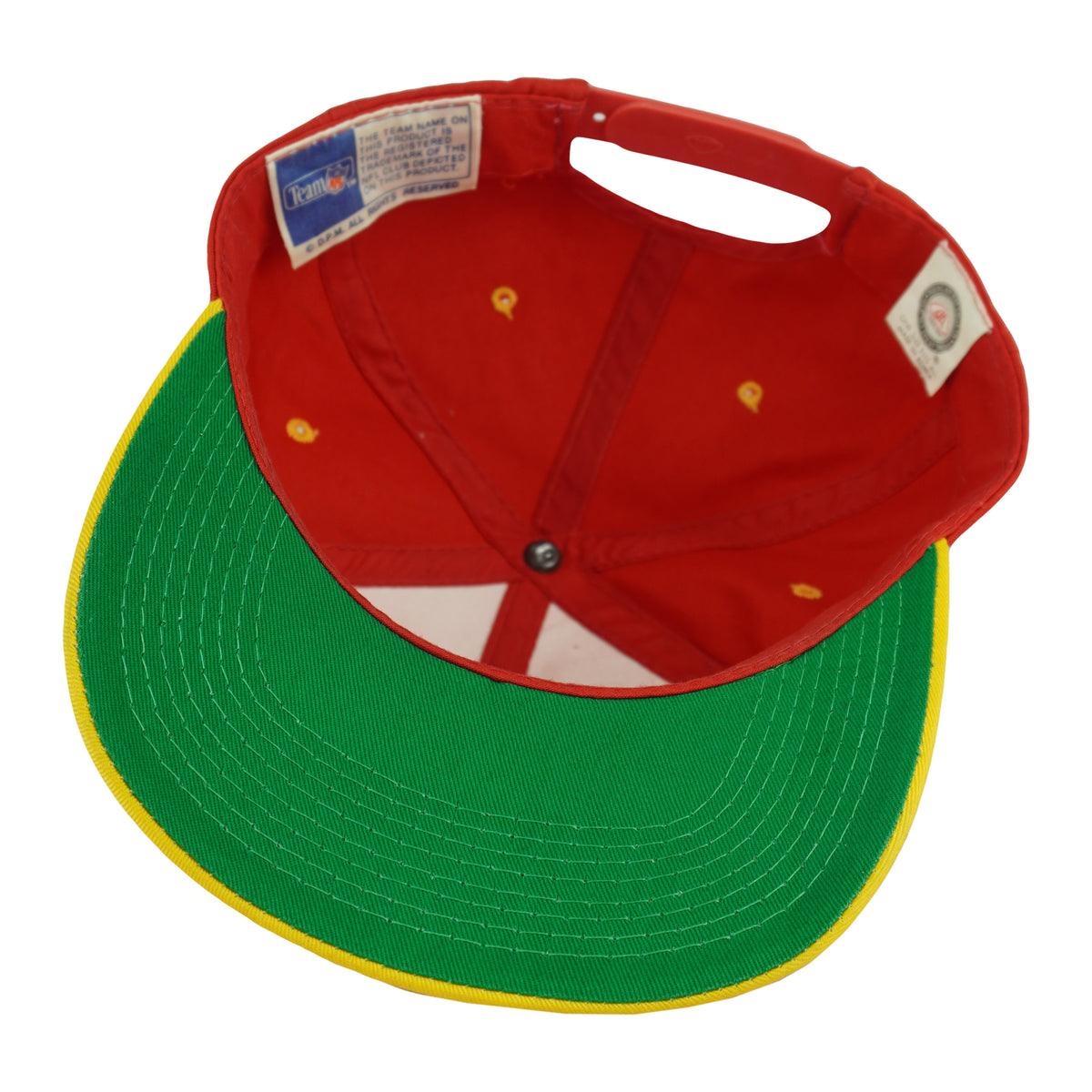 Interior red crown and green underside of the Chiefs brim
