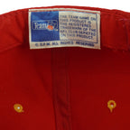 Team NFL licensing label inside the red Chiefs hat
