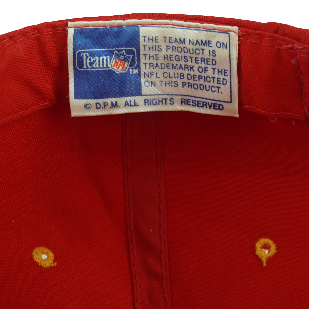 Team NFL licensing label inside the red Chiefs hat