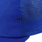 Small dark marks beside the blue Mets hat side seam