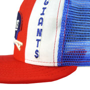 Close view of Giants lettering beside the blue mesh seam