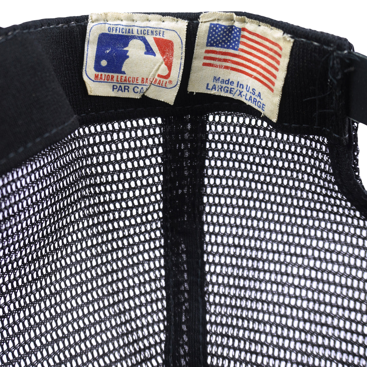 MLB and Large to X-Large labels inside the Giants hat