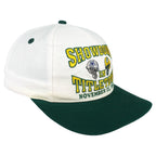Angled view of the Logo 7 hat and green brim