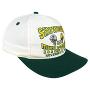 Angled view of the Logo 7 hat and green brim