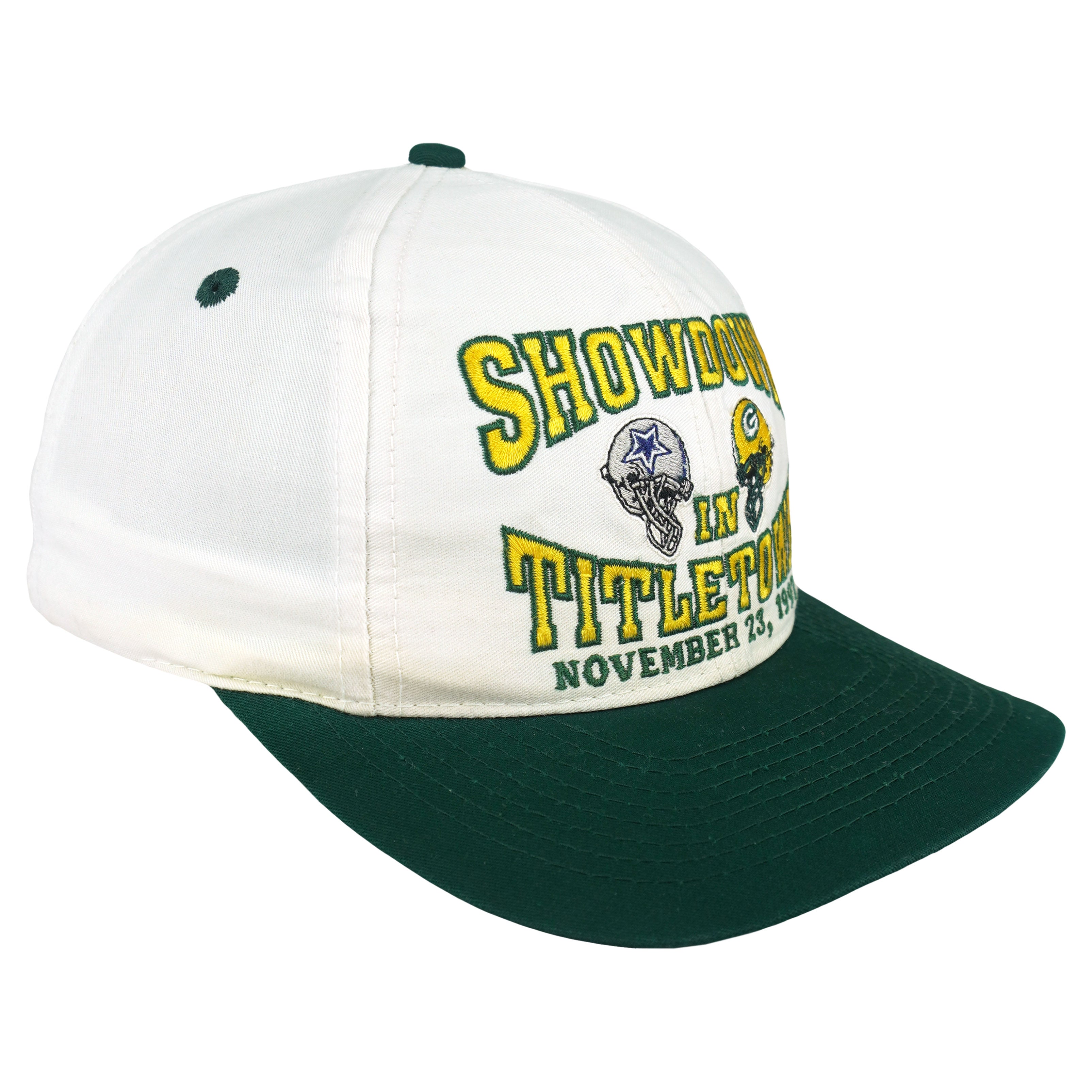 Angled view of the Logo 7 hat and green brim