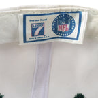 Logo 7 and NFL label inside the Showdown in Titletown hat