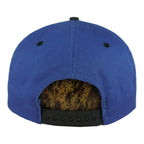Rear snap-closure view of the blue, black, and white Washington Capitals eagle-logo snapback cap