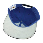 Interior and white underbrim view of the blue, black, and white Washington Capitals eagle-logo snapback cap