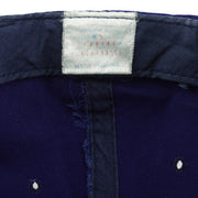 Close view of a faded white interior label inside the blue Seattle Mariners snapback cap