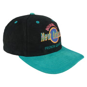 Front-right angle of the black and teal New Orleans Bourbon Street snapback cap