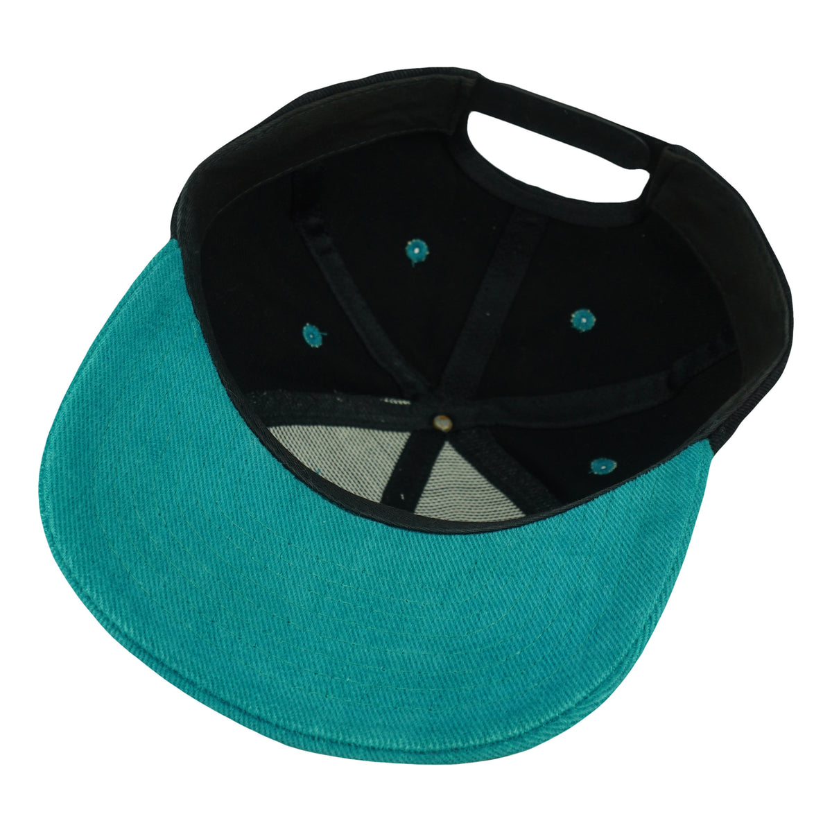 Interior and teal underbrim view of the black and teal New Orleans Bourbon Street snapback cap