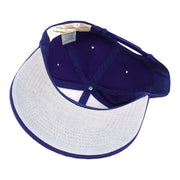 Interior and white underbrim view of the purple and white Milwaukee Brewers glove-logo snapback cap