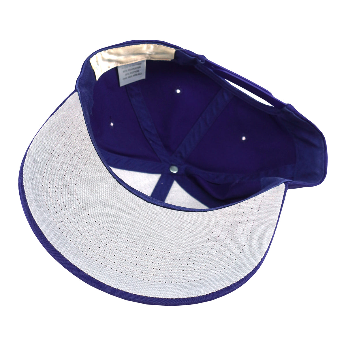 Interior and white underbrim view of the purple and white Milwaukee Brewers glove-logo snapback cap