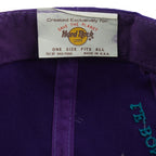Hard Rock Cafe label detail of the purple, black, and green Hard Rock New Orleans Mardi Gras snapback cap