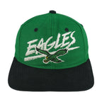 Front view of the green and black 1990s NFL Philadelphia Eagles wraparound-word snapback cap by Signature