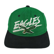 Front view of the green and black 1990s NFL Philadelphia Eagles wraparound-word snapback cap by Signature