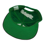 Interior and green underbrim view of the green and black Philadelphia Eagles wraparound-word snapback cap