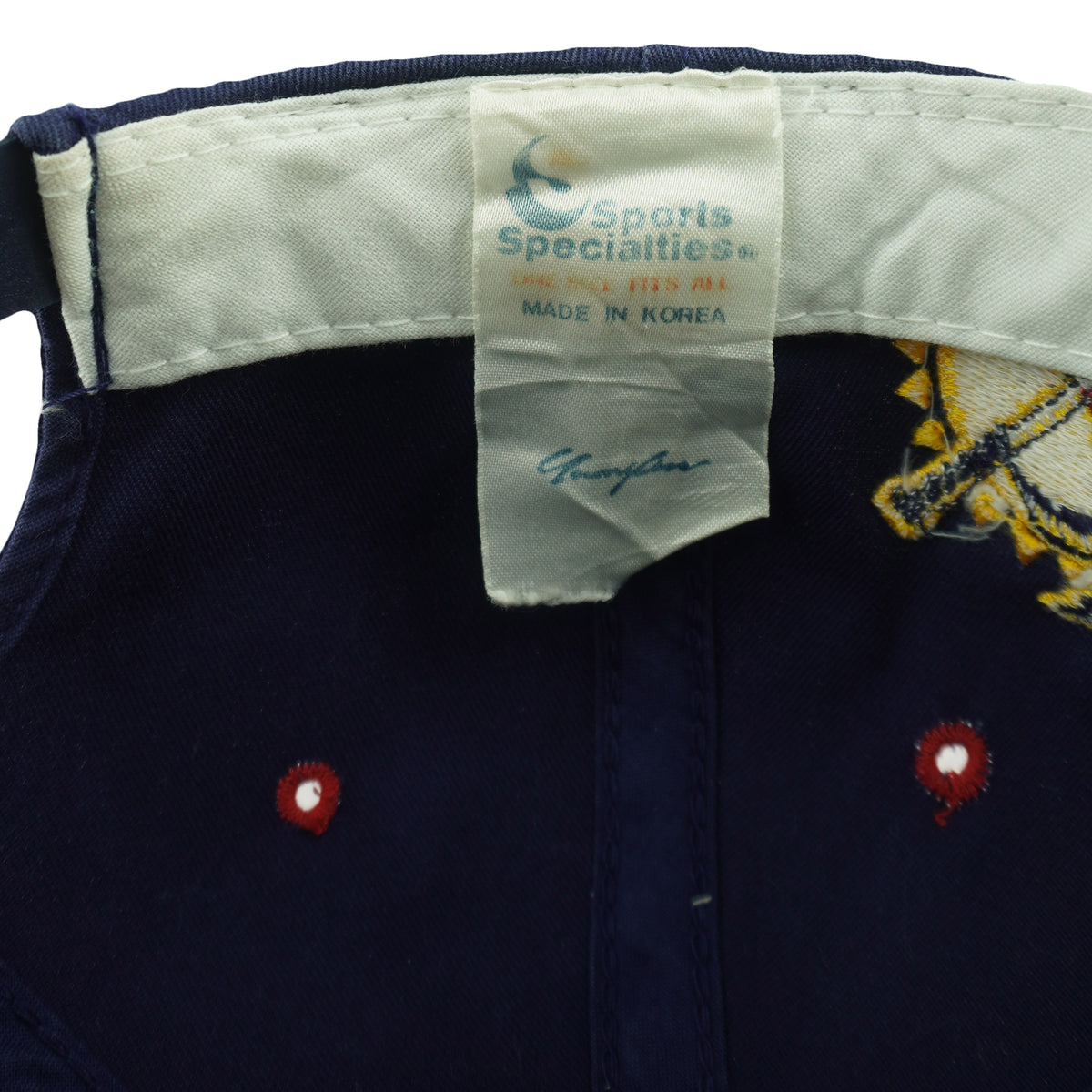 Sports Specialties country label detail of the blue, red, and green Florida Panthers Sports Specialties snapback cap