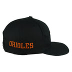 Right side of the black Baltimore Orioles cap with orange ORIOLES embroidery