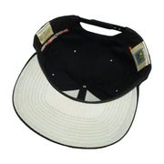 Interior and white underbrim view of the black and white Baltimore Orioles bird-logo snapback cap