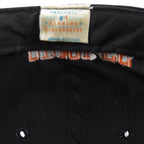 Close view of the white MLB one-size label inside the black Baltimore Orioles snapback cap
