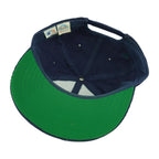 Interior and green underbrim view of the blue and green Boston Red Sox corduroy snapback cap