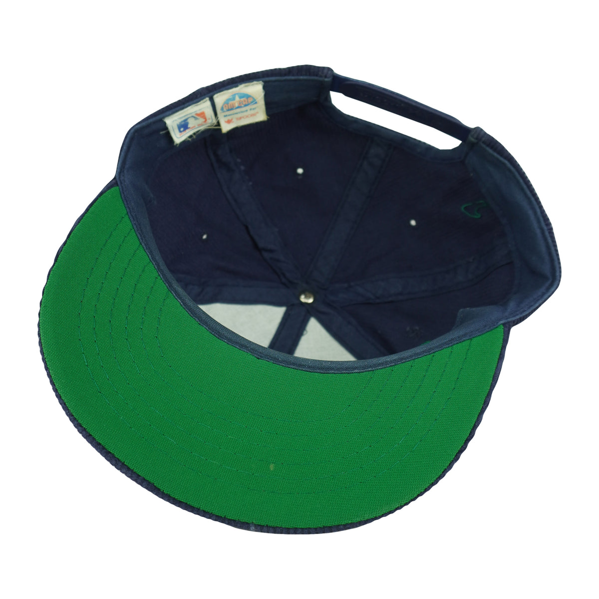 Interior and green underbrim view of the blue and green Boston Red Sox corduroy snapback cap