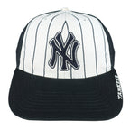 Yankees cap front with white pinstriped panels, dark brim and embroidered NY logo