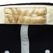 Close-up of the faded blank inner sweatband label on the New York Yankees hat