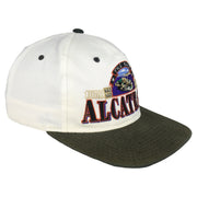 Angled front and side view of the white, black, and green The Rock Alcatraz scenic snapback hat