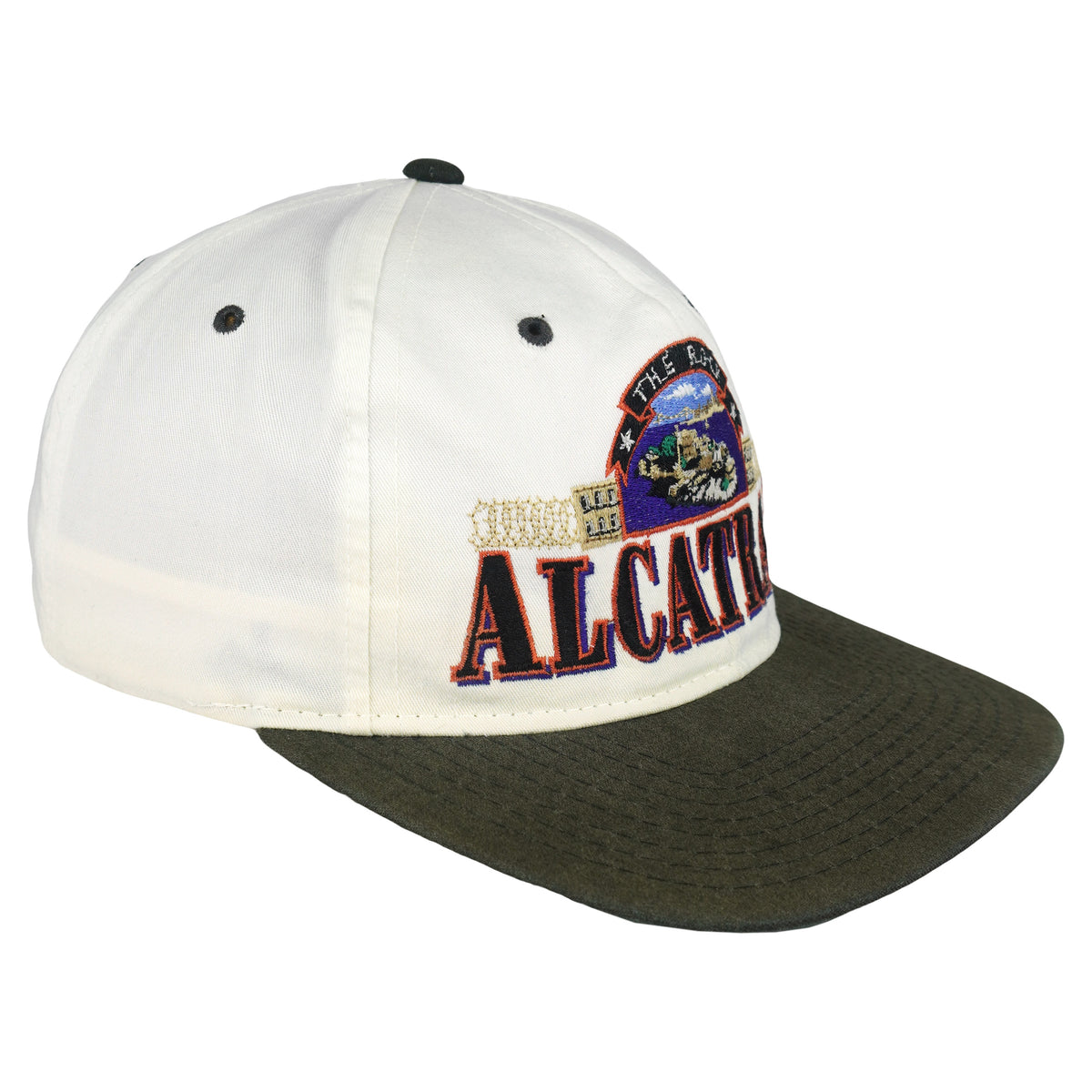 Angled front and side view of the white, black, and green The Rock Alcatraz scenic snapback hat