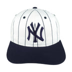 New York Yankees cap front with a white pinstriped crown, navy brim and NY logo