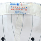 Red and blue MLB logo label stitched inside the white New York Yankees cap
