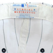Red and blue MLB logo label stitched inside the white New York Yankees cap